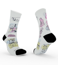 White socks with colorful cartoon designs on a white background